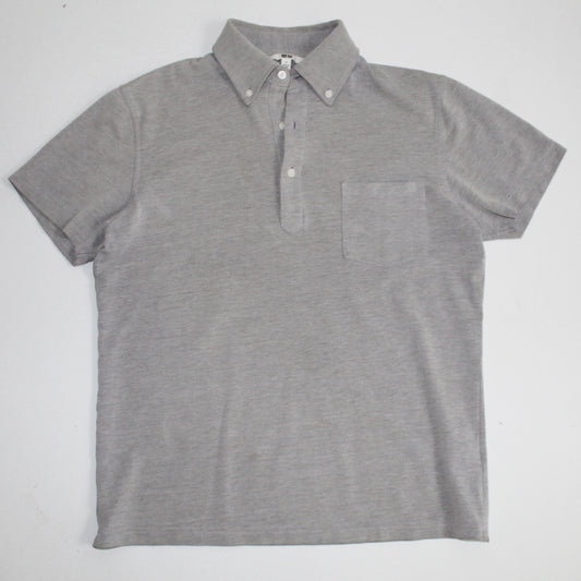 Polo Uniqlo Gris  (S)